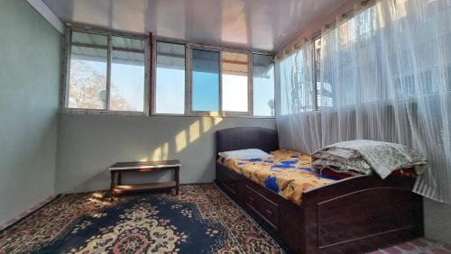 Ένα ή περισσότερα κρεβάτια σε δωμάτιο στο Elephant Top Holiday Nepal, Homestay, Tansen