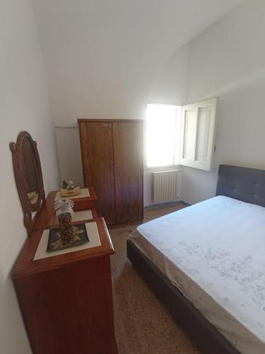 Postel nebo postele na pokoji v ubytování Appartamenti Cavour