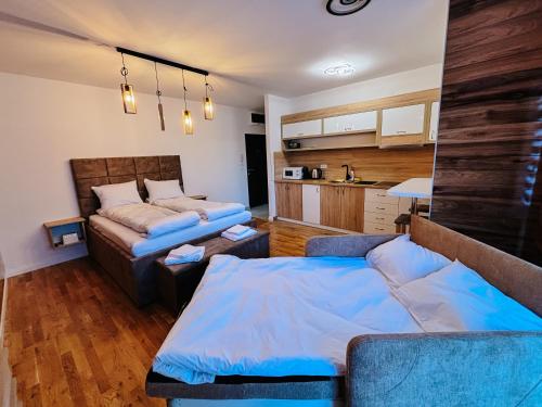 Postel nebo postele na pokoji v ubytování A-apartmani