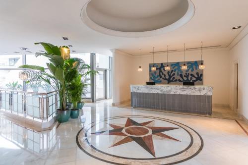 a lobby with a star on the floor at Sesimbra Oceanfront Hotel - Preferred Hotels and Resorts in Sesimbra
