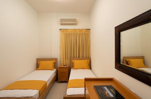 เตียงในห้องที่ Central SeaView Heven Apartment in Fira Santorini
