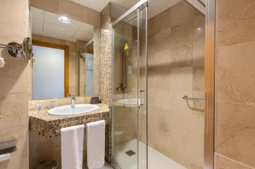 Un baño de Hotel Poseidon Playa