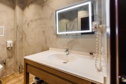 Un baño de Hotel Amelia Mare