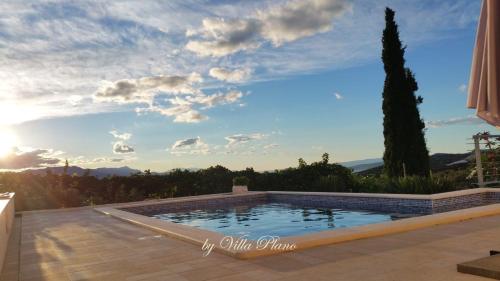 Ferienhaus in Plano mit Offenem Kamin und Meerblick