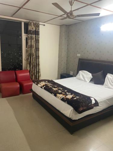 Hotel Star View tesisinde bir odada yatak veya yataklar