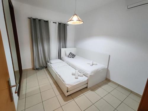 Katil atau katil-katil dalam bilik di O Nosso Cantinho - Private Property & Pool