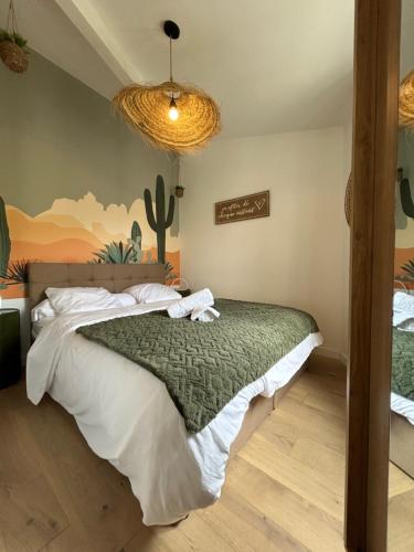 Katil atau katil-katil dalam bilik di Arizona Dream - T1 Bis Climatisé 4p WiFi