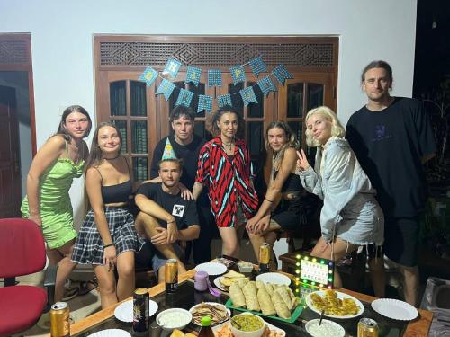 a group of people are posing for a picture at Dream Villa - Weligama in Weligama