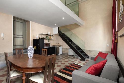 a living room with a couch and a table at Asso Residence Narni in Narni