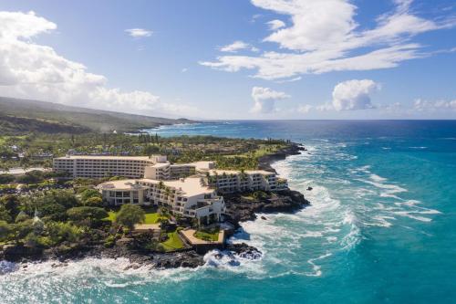 an aerial view of a resort on the ocean at Outrigger Kona Resort and Spa in Kailua-Kona