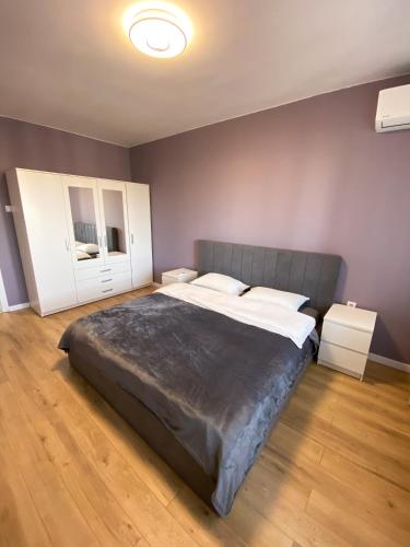 Postel nebo postele na pokoji v ubytování Urban Edge by RV Apartments