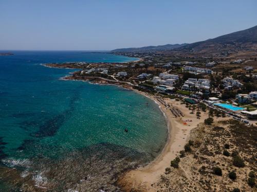 an aerial view of a beach and the ocean at Paros Blue Dolphin FULLY RENOVATED by RIVEA GROUP in Chrissi Akti