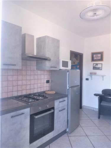 Kuchyň nebo kuchyňský kout v ubytování B&B Casa Vacanze La Mimosa Alghero
