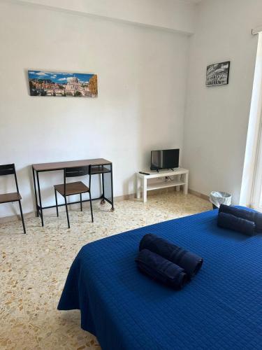 Postel nebo postele na pokoji v ubytování Palm Rooms