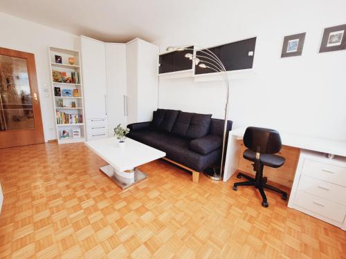 Posezení v ubytování Ferienwohnung nähe Redbull Ring