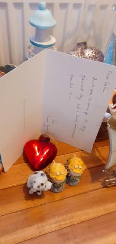 a piece of paper sitting on top of some cupcakes at Marina & Seagulls in East Cowes