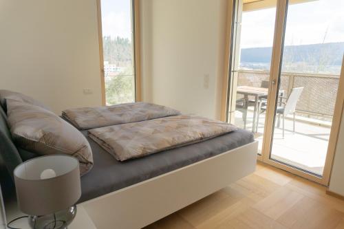 Ένα ή περισσότερα κρεβάτια σε δωμάτιο στο N24 Apartments