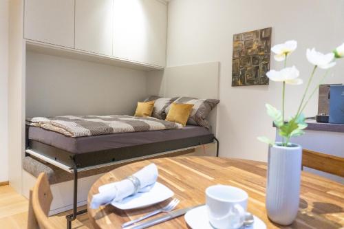 Ένα ή περισσότερα κρεβάτια σε δωμάτιο στο N24 Apartments