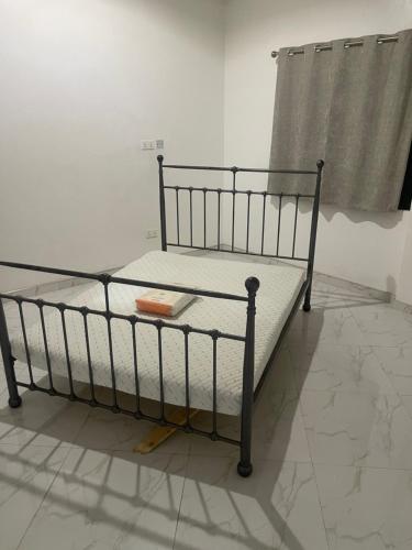 Ένα ή περισσότερα κρεβάτια σε δωμάτιο στο Michael’s Apartment Complex
