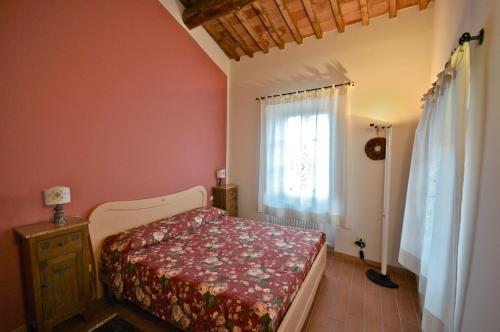 Letto o letti in una camera di Agriturismo San Rocco