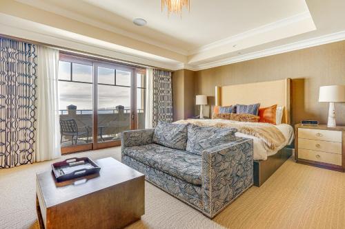 a living room with a couch and a bed at Ski-InandSki-Out Condo in Park City with 6 Balconies! in Park City