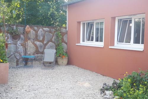 Photo de la galerie de l'établissement La maison de Philippe & Maryse en Bourgogne Franche Comté Dijon, entre ville, jardins et vignes, aux portes de la Cité Internationale Gastronomique et du Vin, à Dijon