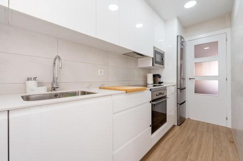 Η κουζίνα ή μικρή κουζίνα στο Apartamentos Cunidor - Cunit
