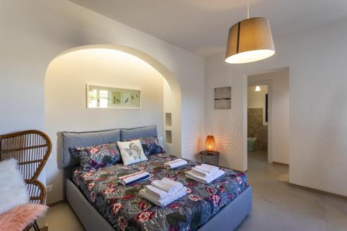Postel nebo postele na pokoji v ubytování Villa Pisciotto - IsulaTravel