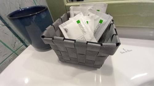 a basket sitting on top of a white table at David House in Bicaz