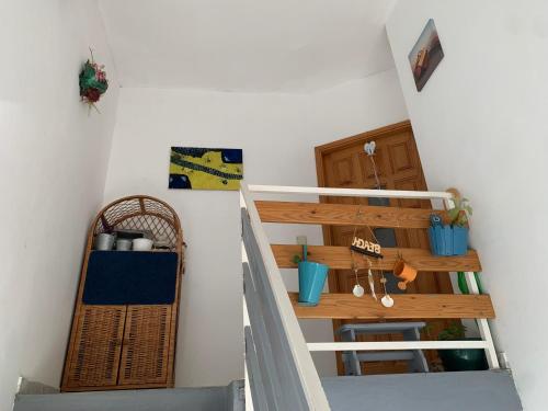 a staircase in a room with a stair case at Apartment Domi in Starigrad