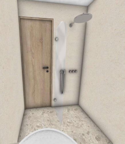 a bathroom with a toilet and a door at Roula Kotsonis Superior Apartment in Argasi