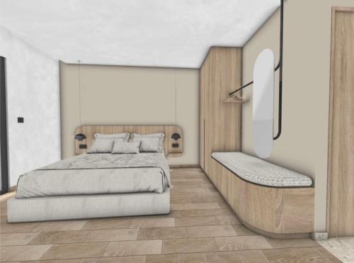 1 Schlafzimmer mit einem Bett und einer Bank in der Unterkunft Roula Kotsonis Superior Apartment in Argassi