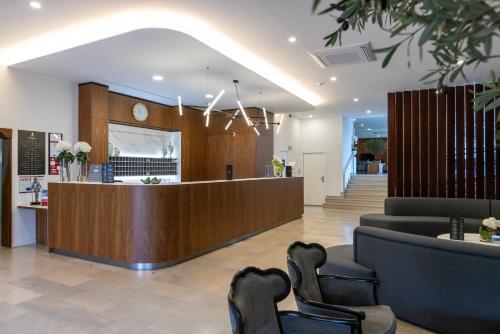 Kuchyň nebo kuchyňský kout v ubytování Hotel Afonso V & SPA