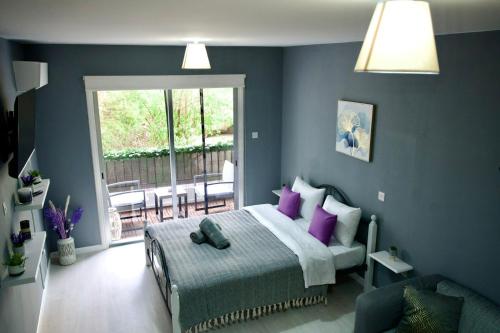 Katil atau katil-katil dalam bilik di Cozy Studio Paphos