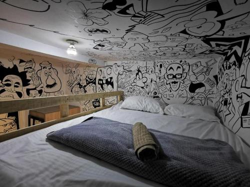 Voodi või voodid majutusasutuse Lienzo Hostel and Mural Art Museum toas