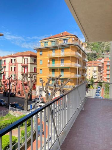 a balcony with a view of a building at ‘La Casa di Rosa’ in Levanto