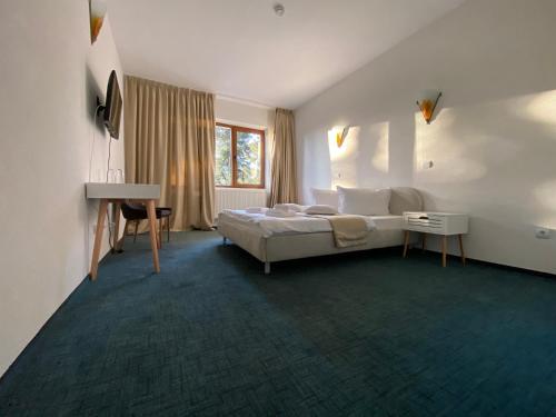 Una cama o camas en una habitación de Chalet Wiese