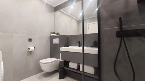 Kúpeľňa v ubytovaní Apartman Spalatum