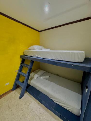 Postel nebo postele na pokoji v ubytování Hostal Panama Experience