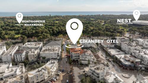 an aerial view of a city with buildings at Cihan Bey Otel Belek in Belek