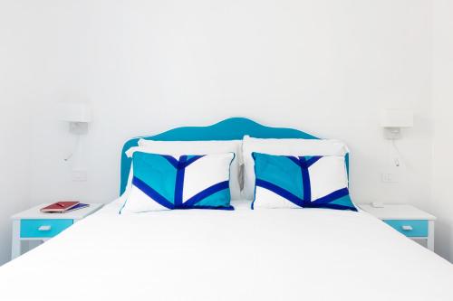 Casa Aurora Positanoにあるベッド