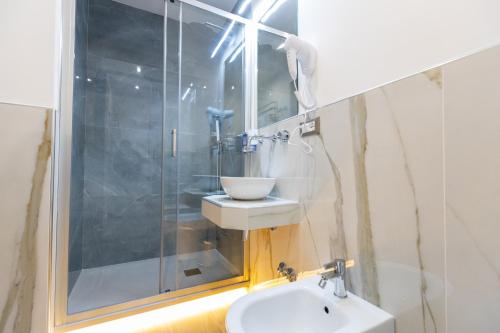 Koupelna v ubytování Hotel Maximus