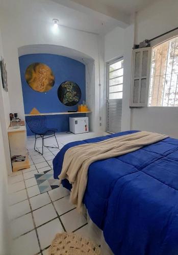 En eller flere senge i et værelse på Hospedaria Guapê