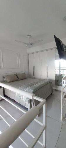 Ένα ή περισσότερα κρεβάτια σε δωμάτιο στο Duplex Impression Morumbi