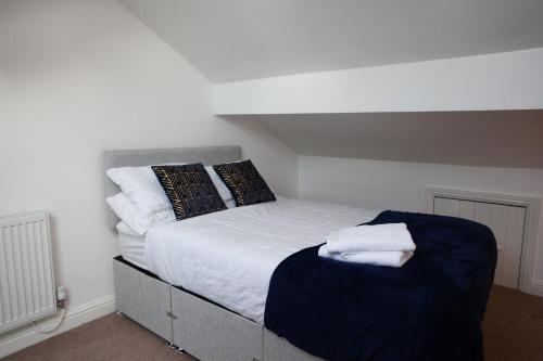 Katil atau katil-katil dalam bilik di Spacious 3 bedroom Cottage in Whalley