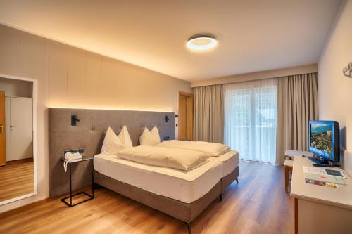 Postel nebo postele na pokoji v ubytování Hotel Lamm
