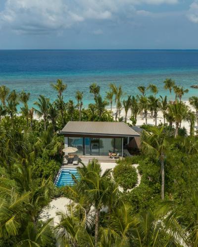 an aerial view of a house on the beach at SO/ Maldives in South Male Atoll