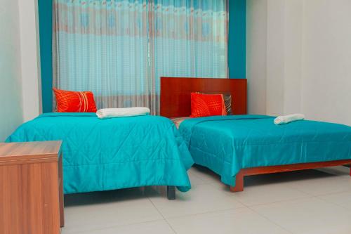 Postel nebo postele na pokoji v ubytování Hotel Señor de Sipán