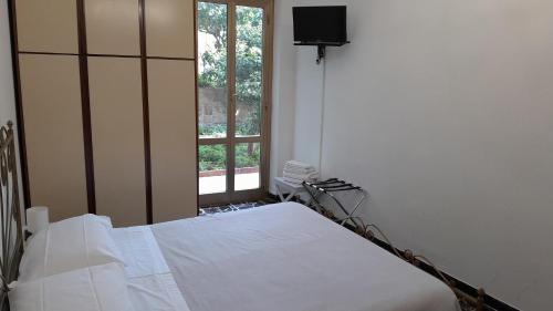 Katil atau katil-katil dalam bilik di Hotel Villa Argentina