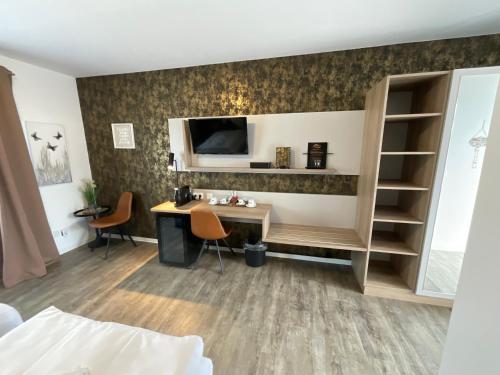 Μια τηλεόραση ή/και κέντρο ψυχαγωγίας στο Gästehaus Würzburg 24h